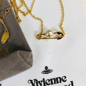Vivienne Westwood gold safety pin necklace